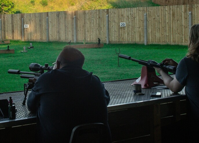 Man firing A Gun At A Sportrap Range